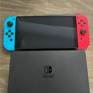 Nintendo Switch Console with Neon Red and Blue Joy-Con w/3 games